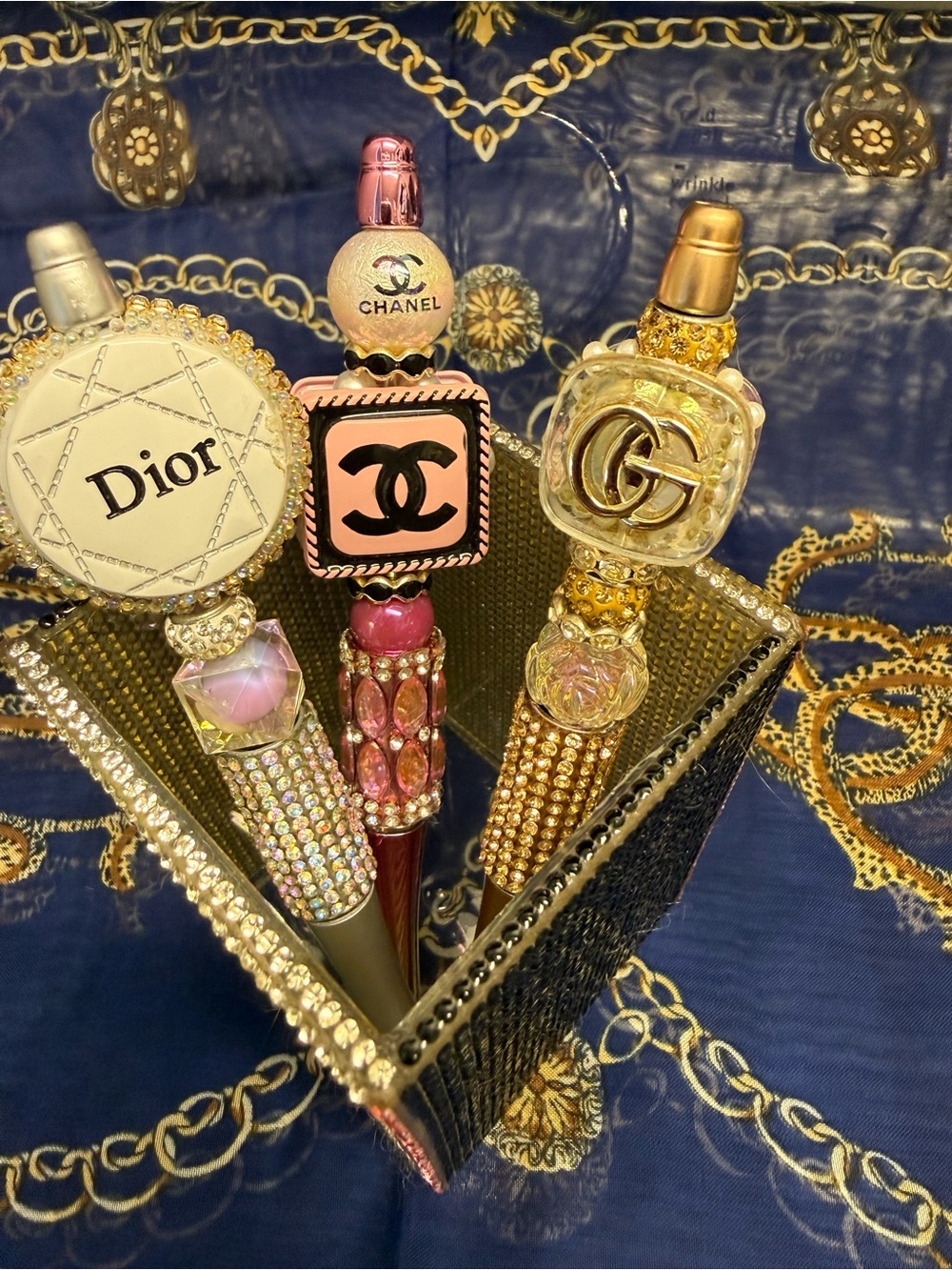 Bling Pen Cup to display your favorite pens!
3 Logo Crystal Pens with purchase